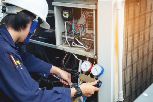 Technician Checking Cycling of an HVAC System