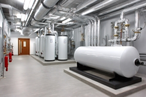 Modern Commercial Boiler Room with Industrial Heating Machinery and Piping
