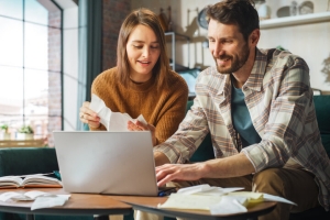 Couple Checking Their Eligibility for Sump Pump Tax Credit