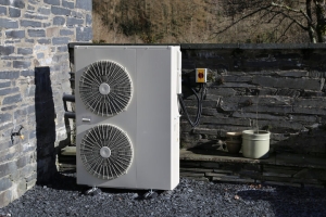 Electric Heat Pump Installed Outdoors in a Pleasantville House