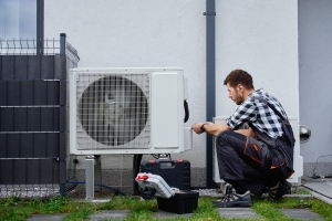 NY Contractor Installing Heat Pump on-a House Outdoor