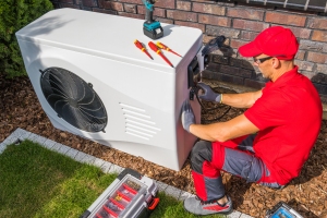 Technician Installing New HVAC System for Upgrade
