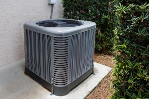 Central Air System Installed on Concrete Slab Outside of House