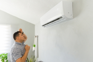 Frustrated Man Feeling Hot Due to Sudden HVAC Breakdown