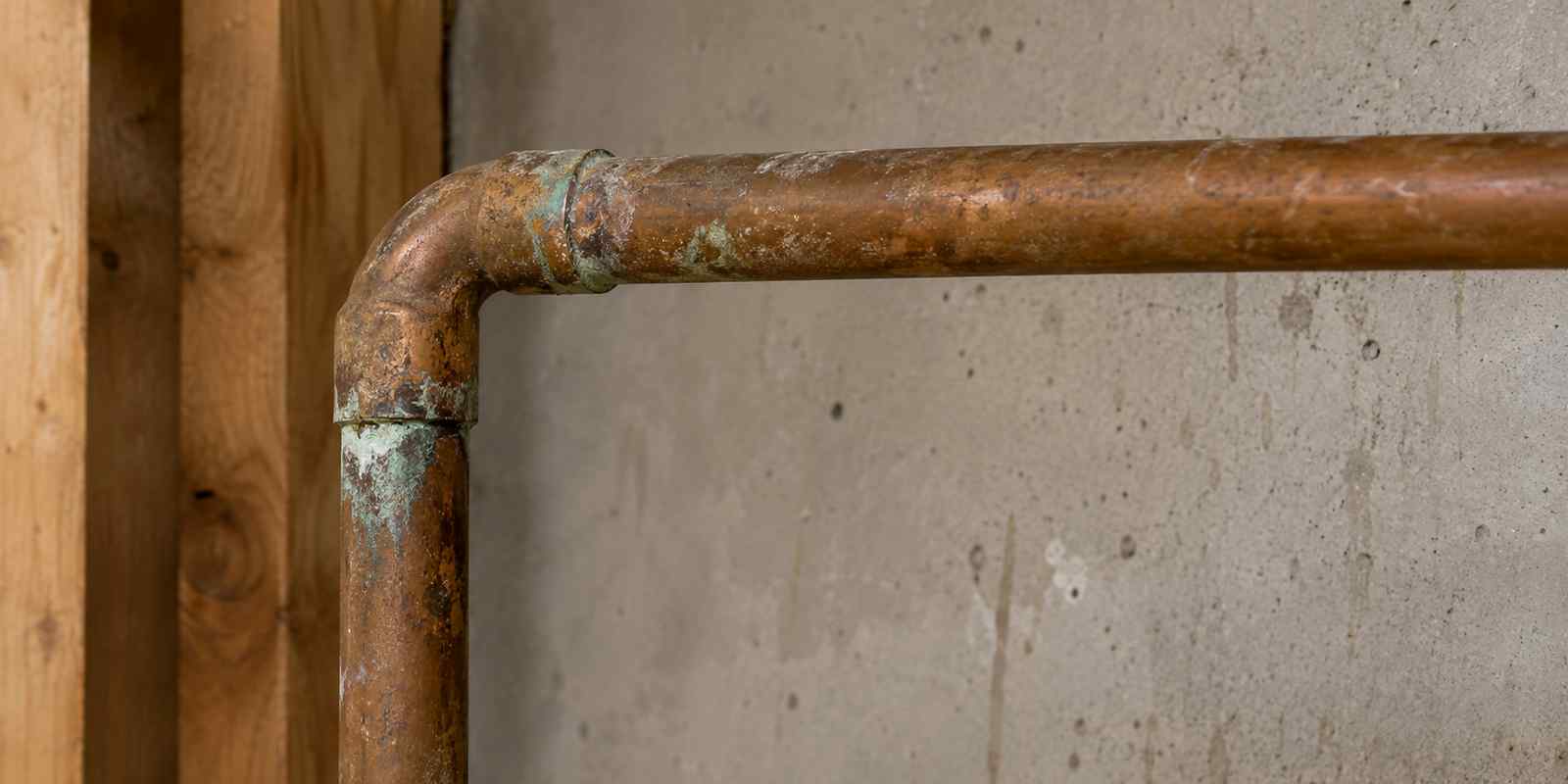 Old Residential Copper Plumbing Pipe with Realistic Surface Rust and Oxidation